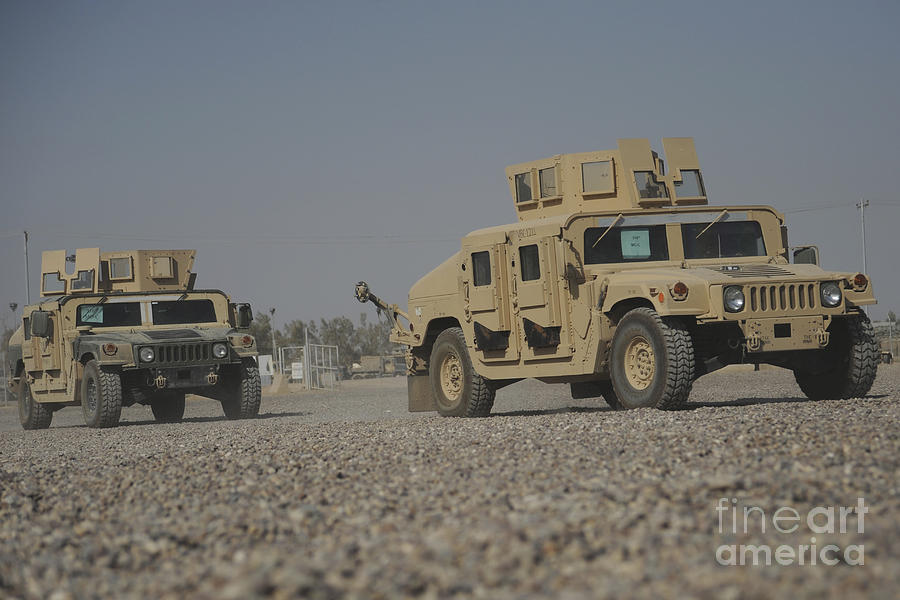 Two M1114 Humvee Vehicles At Camp Taji Photograph by Stocktrek Images