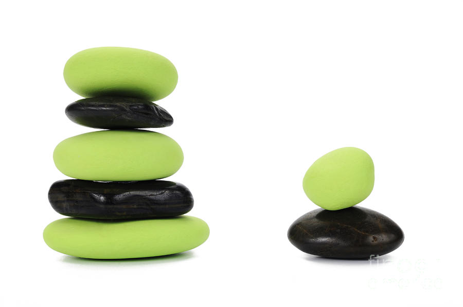 Still Life Photograph - Two stacks of green and black pebbles by alternance by Sami Sarkis