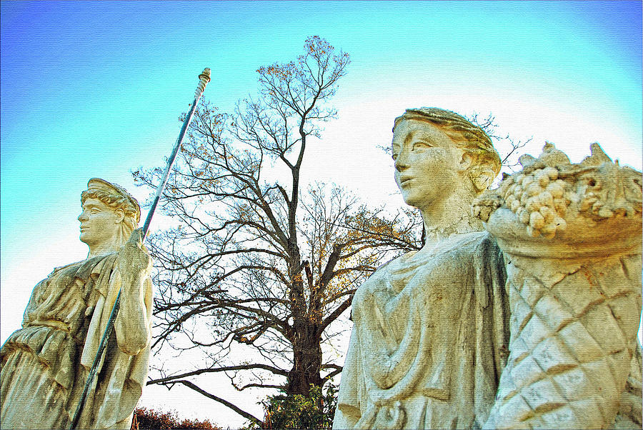 Two statues Photograph by Janet G T