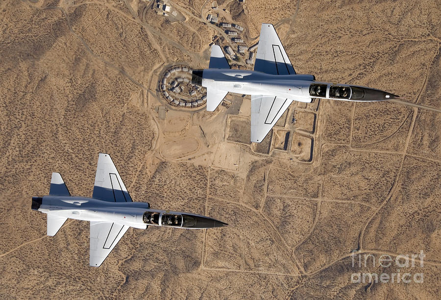 Airplane Photograph - Two T-38a Mission Support Aircraft Fly by Stocktrek Images