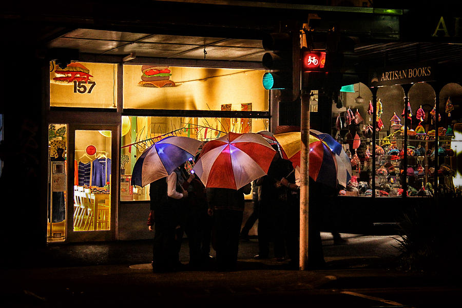 Umbrella Photograph - Umbrella singers by John Monteath