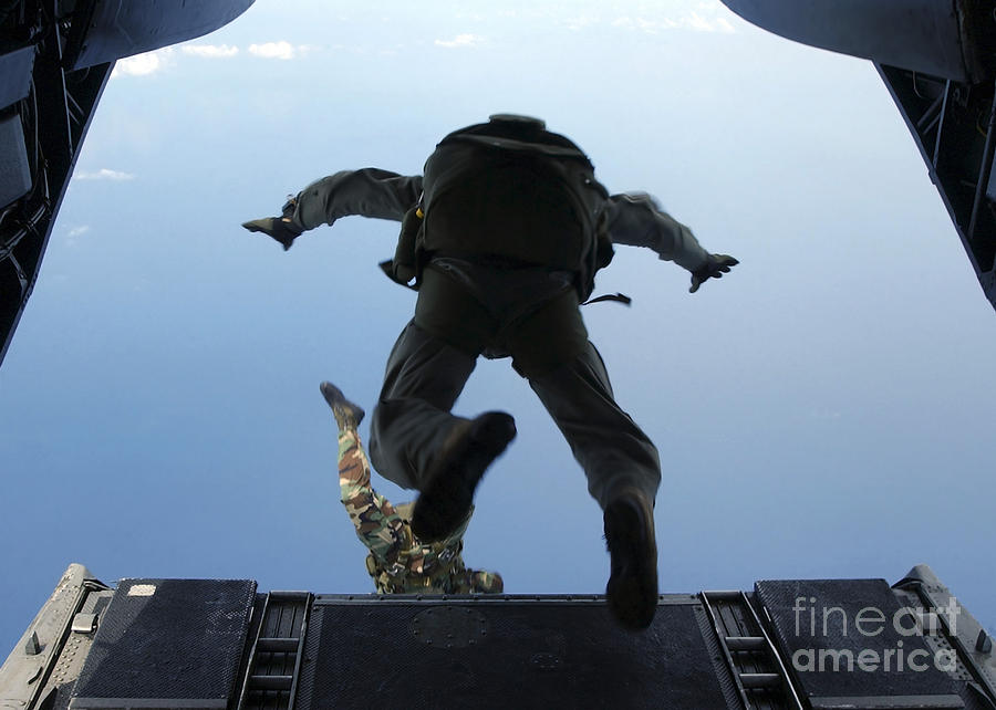U.s. Army Soldiers Perform Halo Jumps Photograph by Stocktrek Images