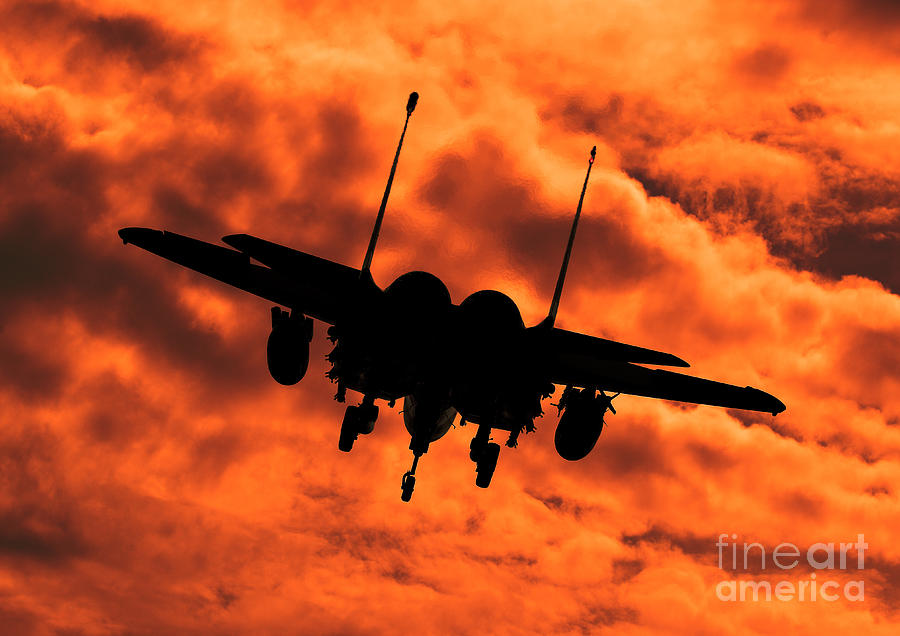 USAF Strike Eagle F15 E flying into the Sunset Photograph by Clare Scott