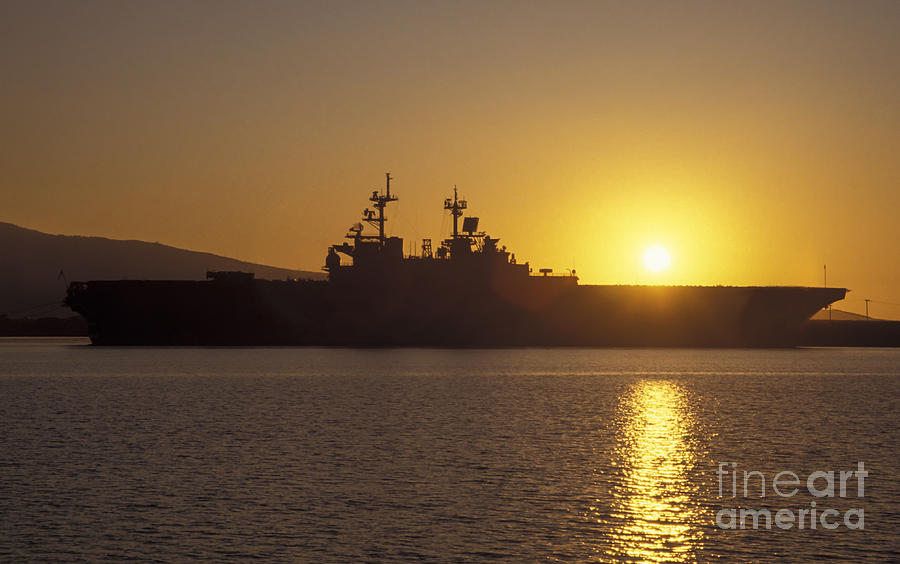 Uss Tarawa Pierside As The Sun Sets Photograph by Michael Wood