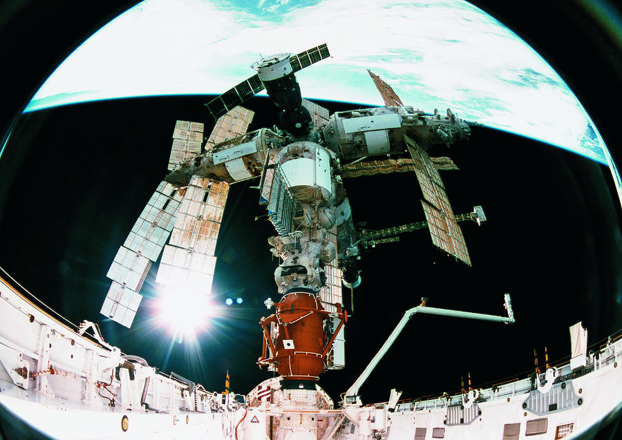 View From A Wide Angle Lenses Of A Space Station Docking In Orbit Photograph by Stockbyte