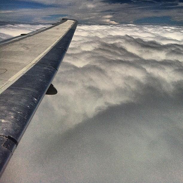 Clouds Photograph - View From The Plane Somewhere Over The by Arnab Mukherjee