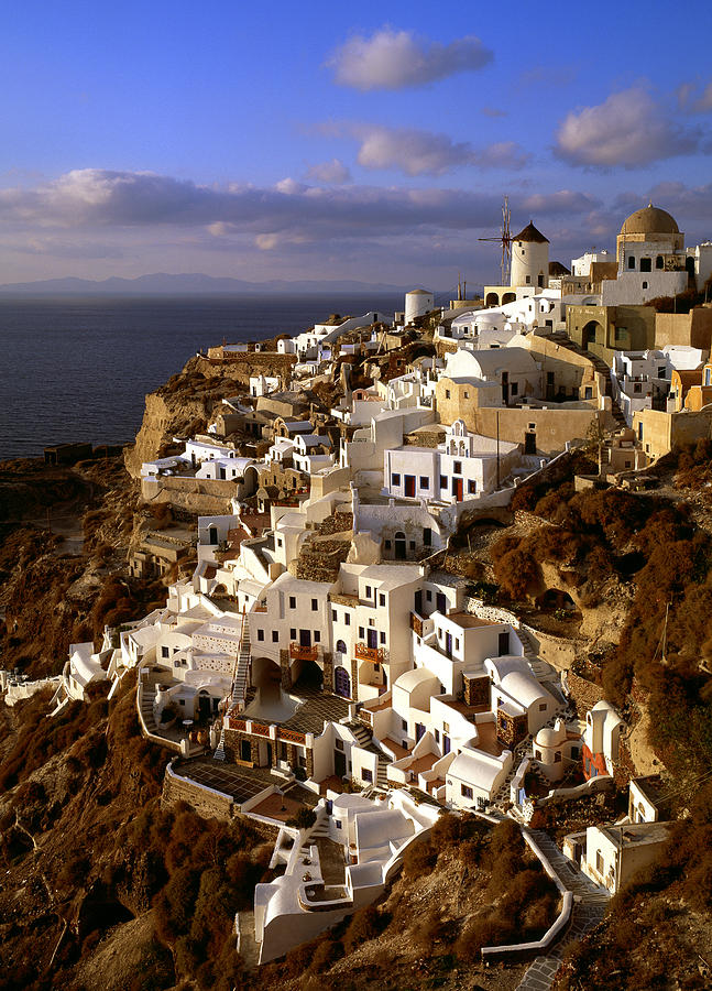 View of city of Oia on Santorini Island Photograph by Cliff Wassmann