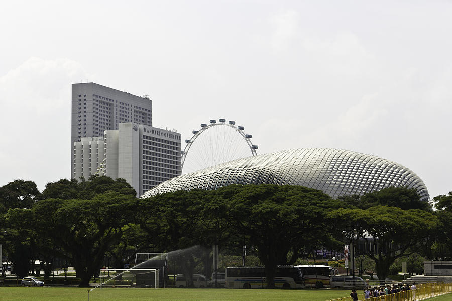 View of Singapore Flyer and Mandarin Oriental hotel and the Espl Photograph by Ashish Agarwal