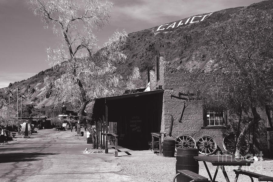 Black And White Photograph - Village Entrance in Calico Ghost Town California by Susanne Van Hulst