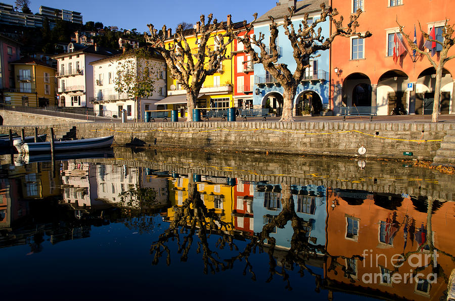 Village reflected in the lake Photograph by Mats Silvan