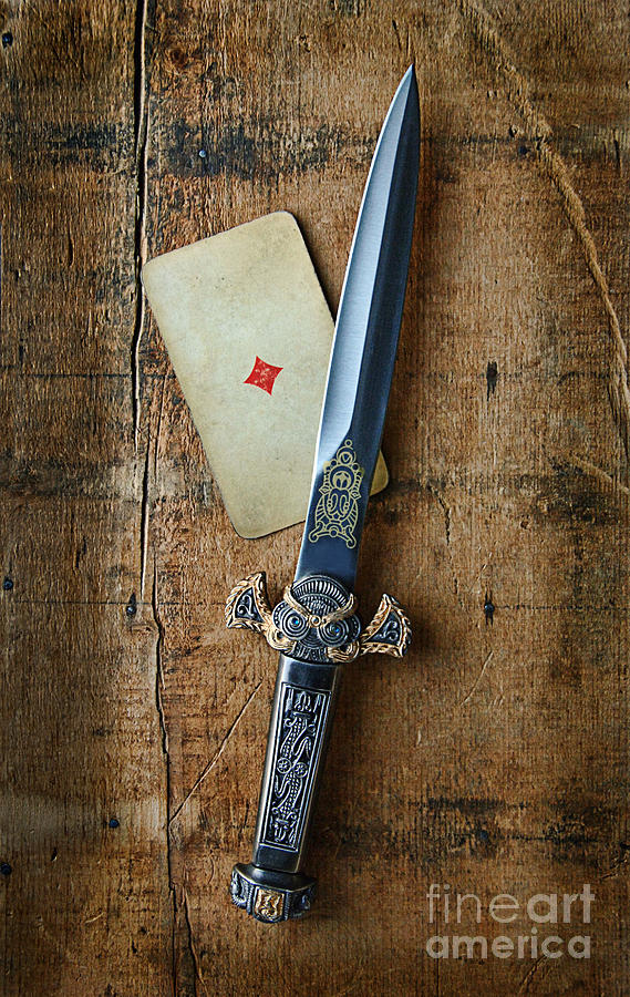Vintage Dagger on Wood Table with Playing Card Photograph by Jill Battaglia