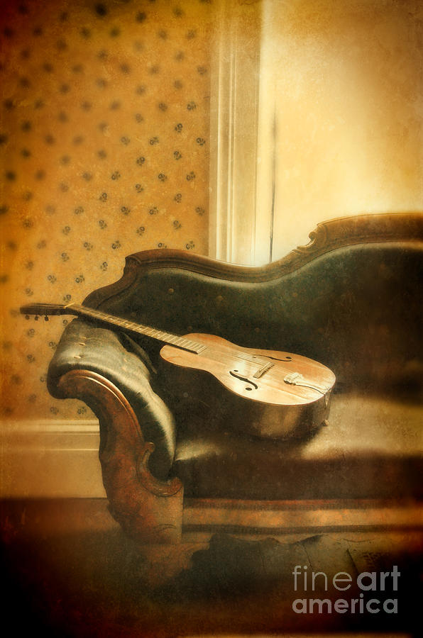 Vintage Guitar on Sofa Photograph by Jill Battaglia