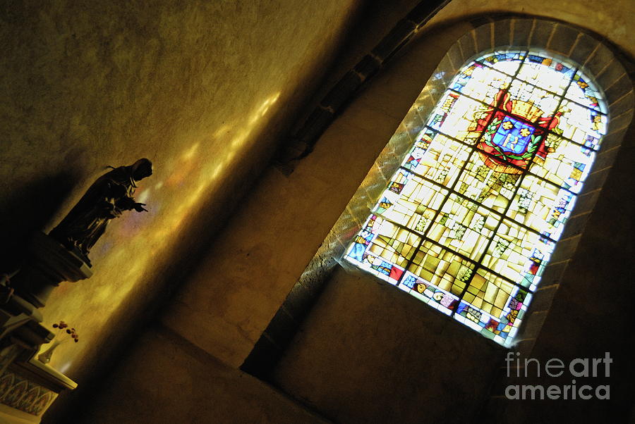 Virgin statue and stained window in a church Photograph by Sami Sarkis