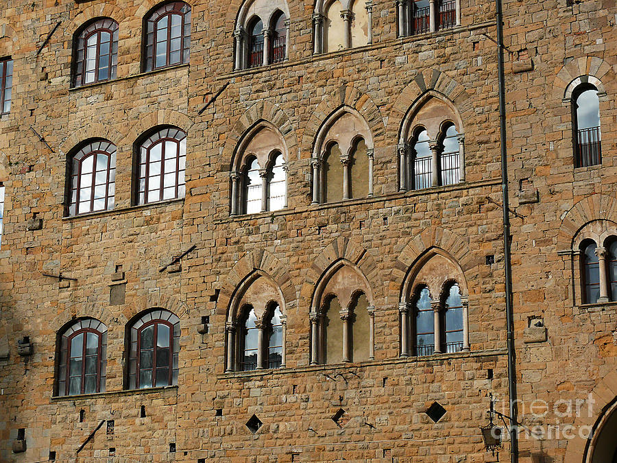 Volterra wall of windows Photograph by Jeanne  Woods