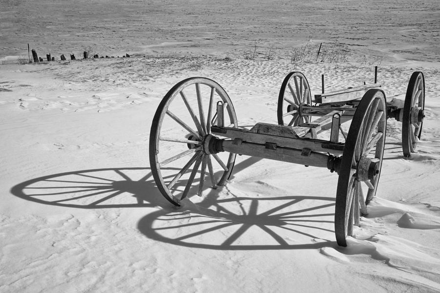 Wagon chassis along the shore at Fayette Michigan State Park Photograph by Randall Nyhof