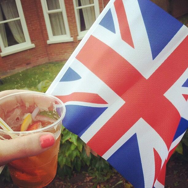 Waiting For The Olympic Torch With Pimms Photograph by Grace Bryant