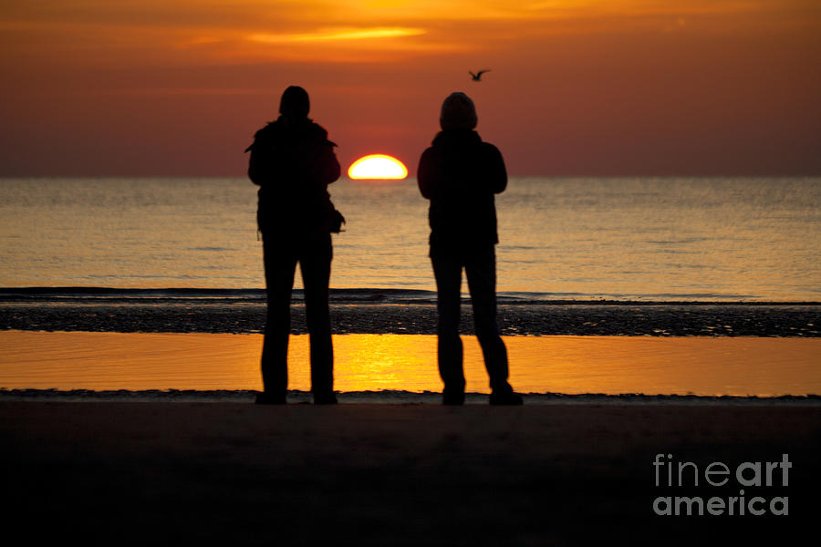 Watching the Sun go Down Over the Sea Photograph by Heiko Koehrer-Wagner