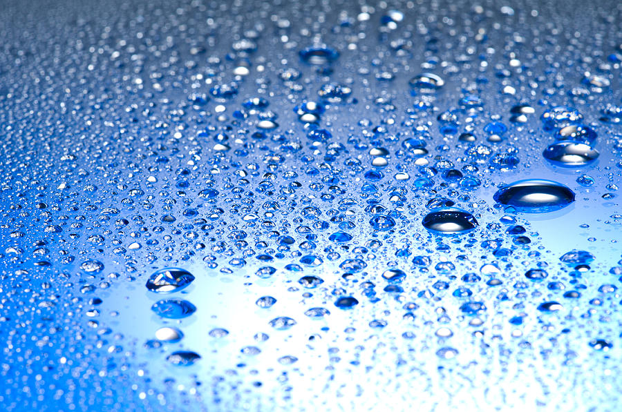 Water drops on a shiny surface Photograph by U Schade