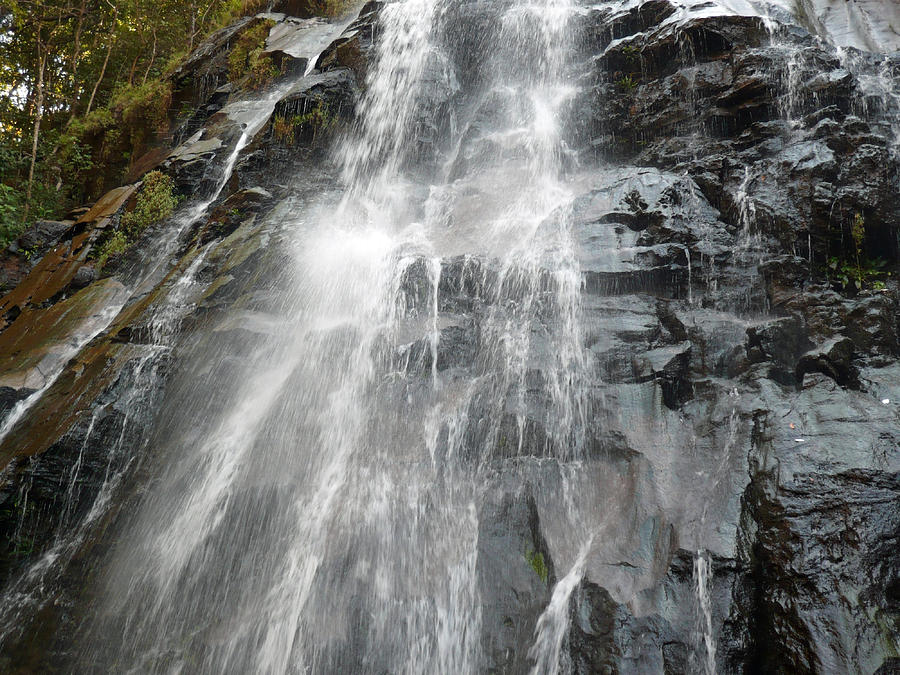 Water falling with force on black rocks at Bees Falls in Pachmarhi Photograph by Ashish Agarwal