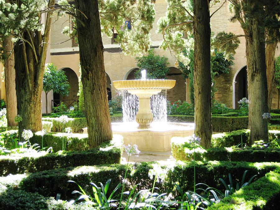 Water Fountain With Sunlight Shinning Thru It Granada Spain Photograph by John Shiron