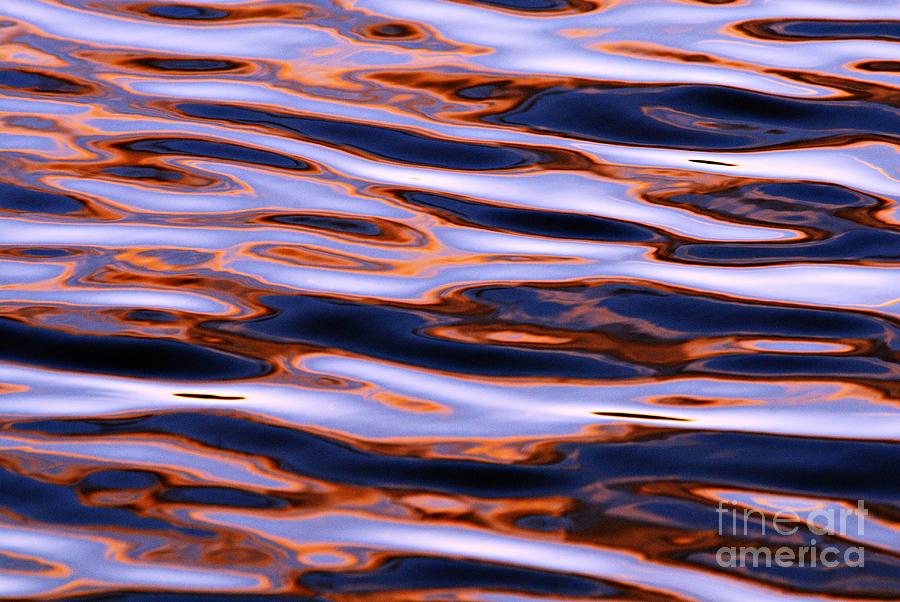 Water Ripples at Sunset Photograph by Larry Ricker