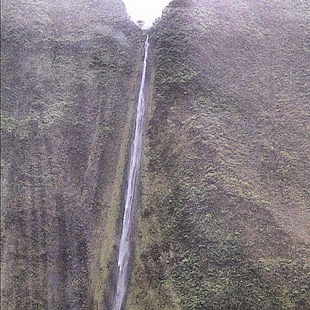 Waterfall In The Middle Of The Volcanic Photograph by Kristin Rogers