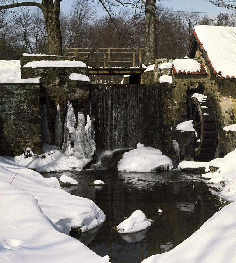 Waterwheel and Stream in Winter Photograph by Sally Weigand