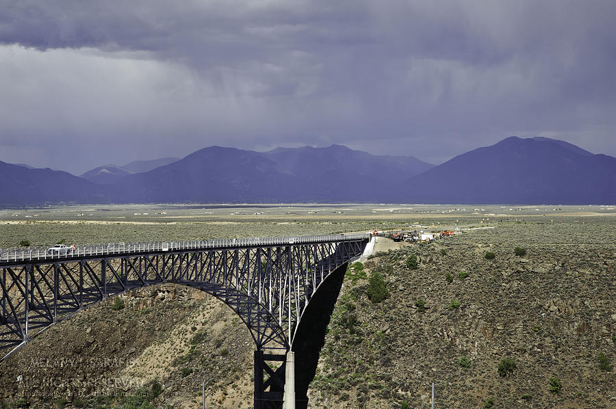 Weather at the Rio Grande Gorge Bridge Photograph by Melany Sarafis