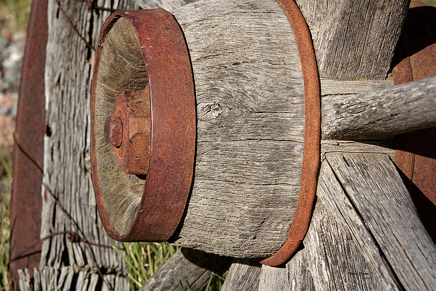Weathered Old Wagon Wheel Photograph by Phyllis Denton