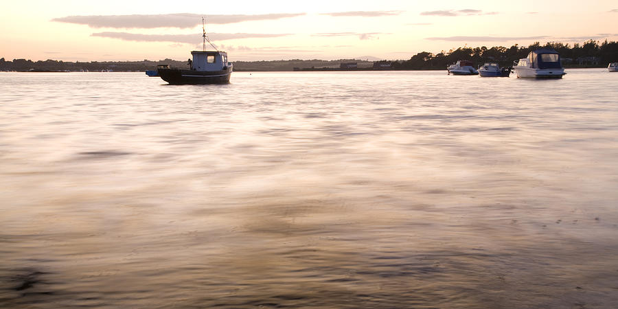 Wexford Harbour at sunset Photograph by Ian Middleton