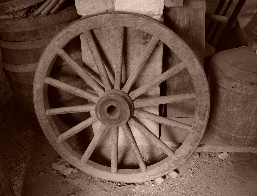 Wheel Photograph - Wheel In The Basement by Dennis Stein
