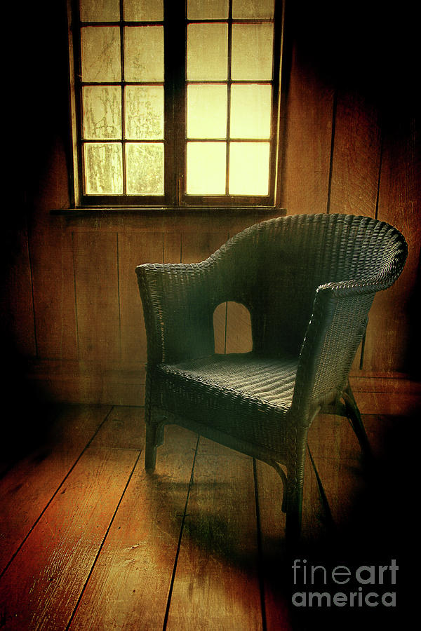 Whicker chair near window Photograph by Sandra Cunningham