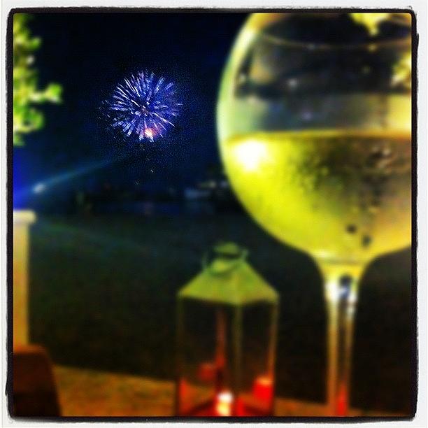 Lantern Still Life Photograph - White Wine and fireworks  by Kimberley Burleigh