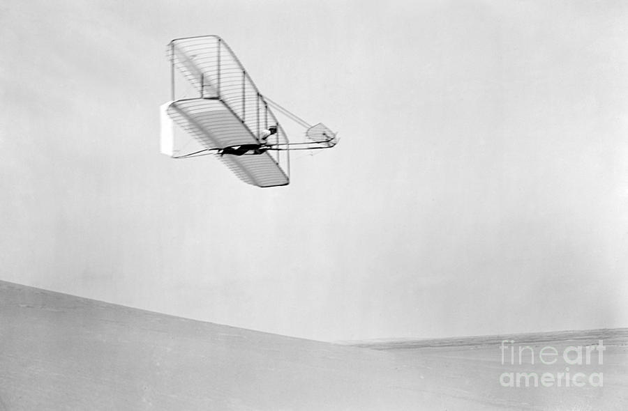 Wilbur Wright In Glider, 1902  by Photo Researchers