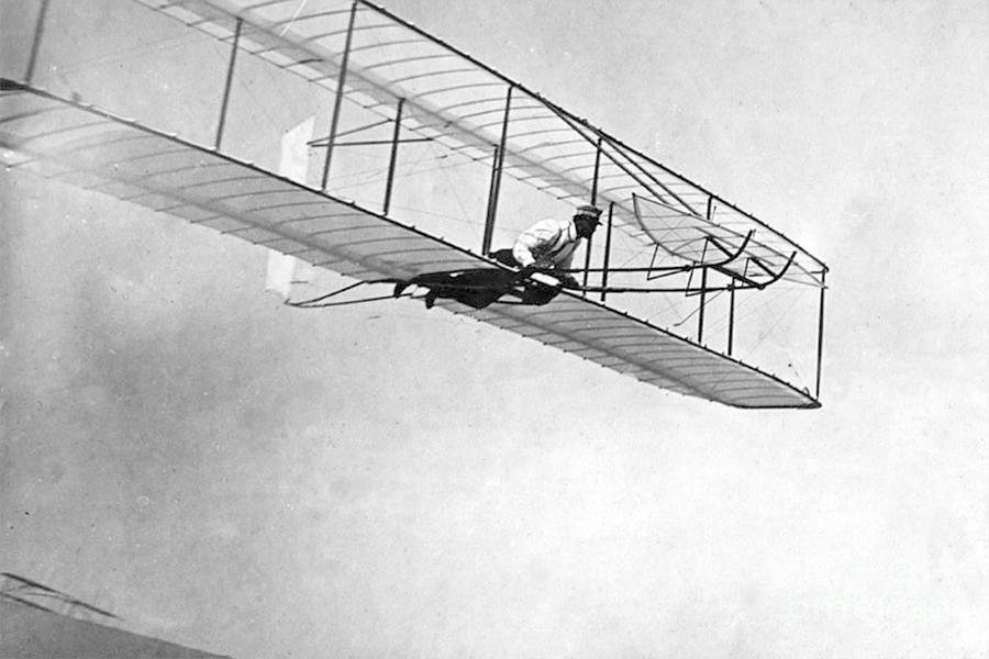 Wilbur Wright Pilots Early Glider, 1902 Photograph by Science Source