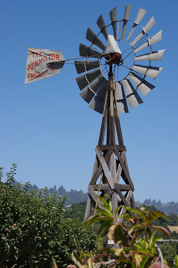 Farm Photograph - Windmill Blue Sky by Jeff Lowe