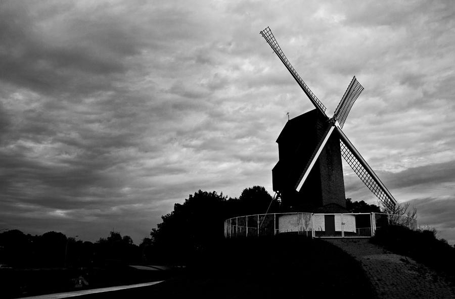 Windmill on a cloudy day. Photograph by David Freuthal