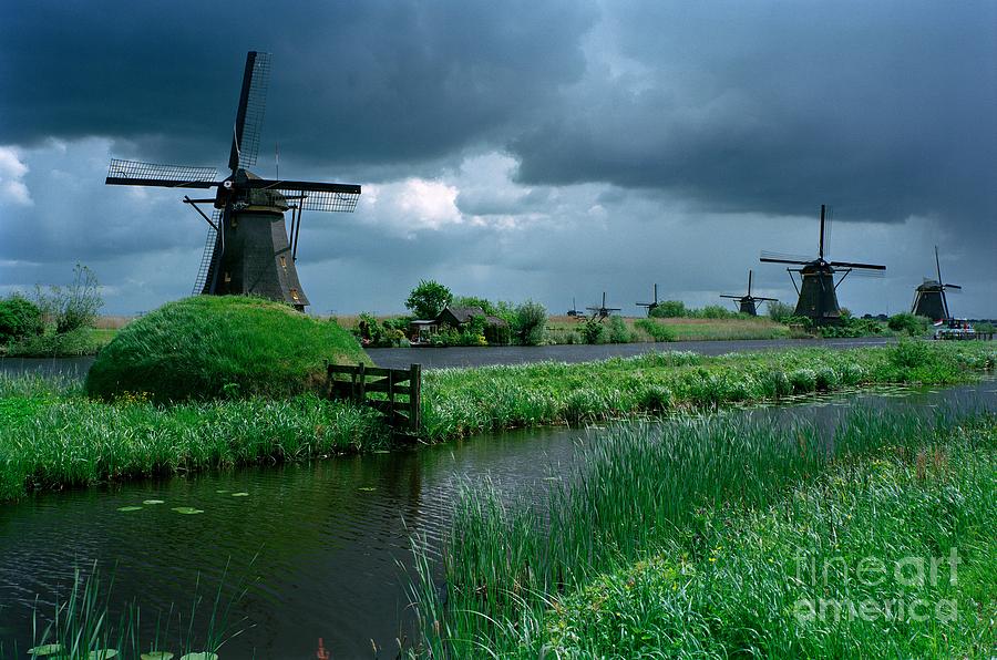 Windmill Photograph - Windmills of Kinderdijk by Serge Fourletoff Windmill Photograph - Windmills of Kinderdijk by Serge Fourletoff