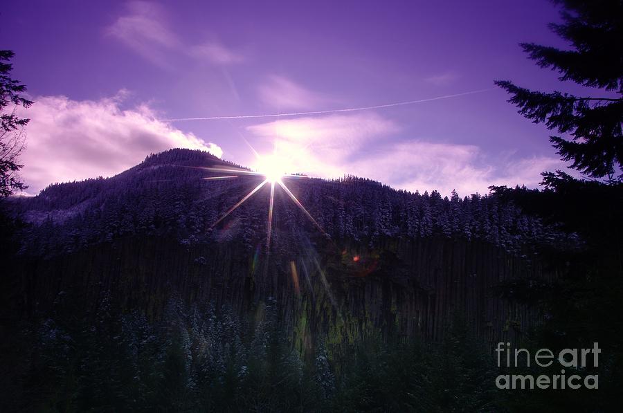 Winter Sun Winking Over The Mountains Photograph by Jeff Swan