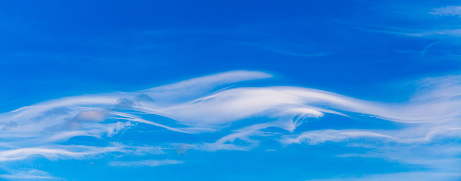 Wispy Clouds spotted on the way home from a awesome walk in the  Photograph by Tommy Farnsworth
