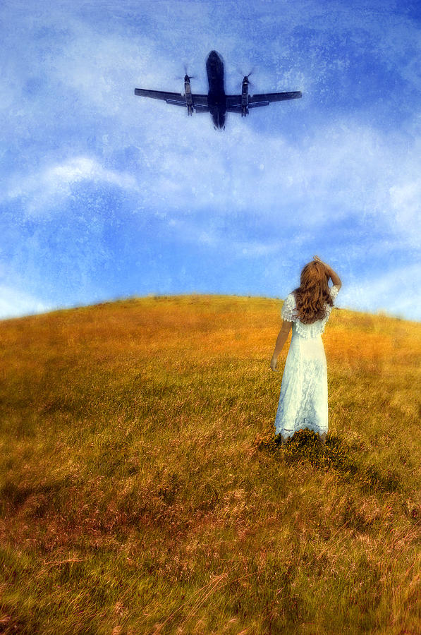 Transportation Photograph - Woman in Field Looking Up at an Airplane by Jill Battaglia