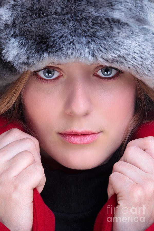 Winter Photograph - Woman in fur hat and red coat by Richard Thomas