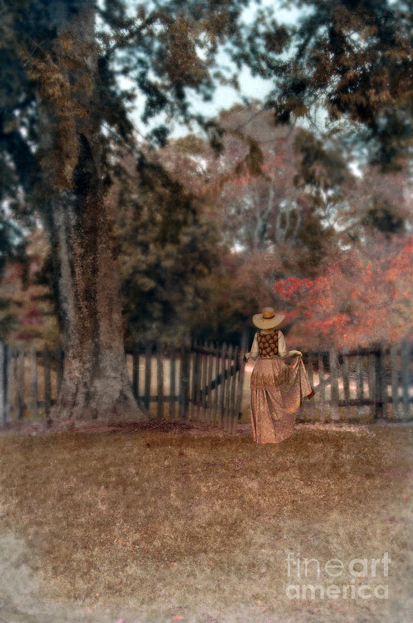 Woman in Long Dress and Straw Hat Entering Gate Photograph by Jill Battaglia