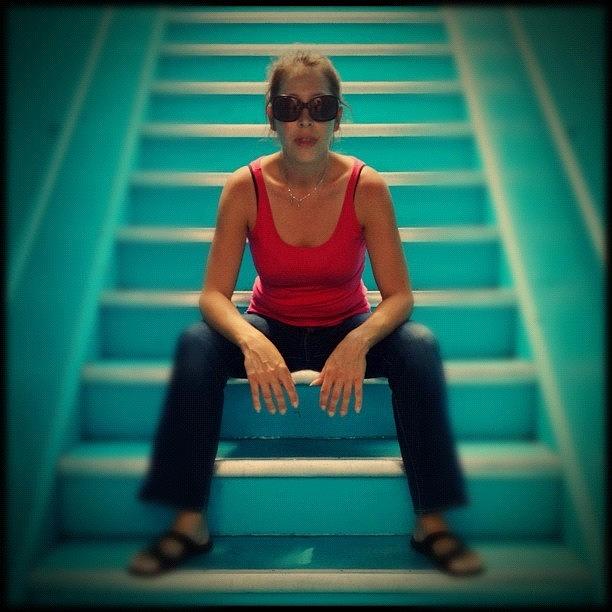 Portrait Photograph - Woman in stairs by Isabel Poulin