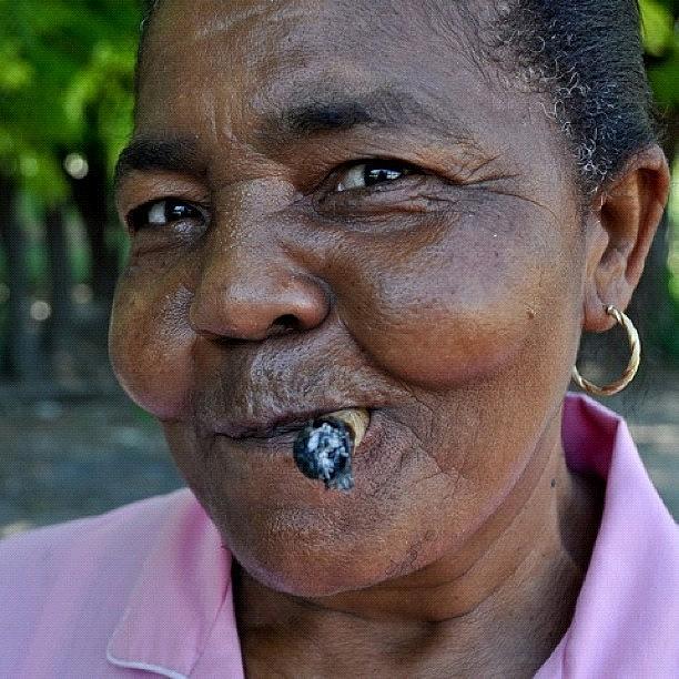 Woman Smoking A pachuche Photograph by Giovanni Savino