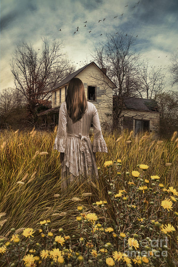 Woman walking in field towards abandoned farmhouse  Photograph by Sandra Cunningham