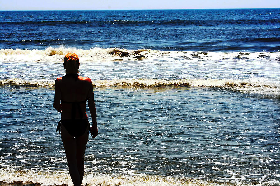 Woman Walking Into Ocean Surf  Photograph by Susan Stevenson