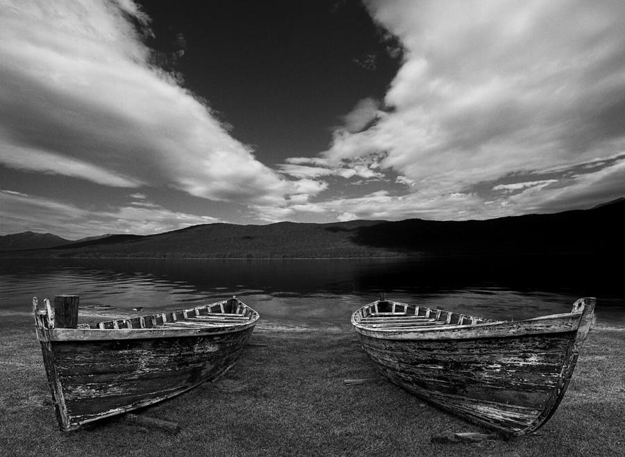 Wooden Row Boats at the Edge of a Lake Photograph by Randall Nyhof
