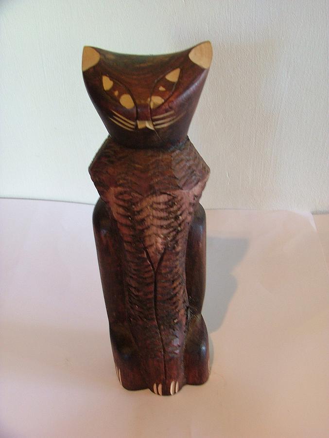 wooden cat sculpture