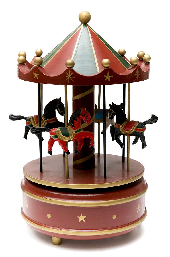 Still Life Photograph - Wooden toy carousel by Fabrizio Troiani